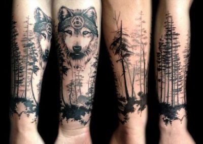 тату волк лес на руке