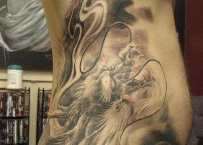 татуировка дьявола на ребрах