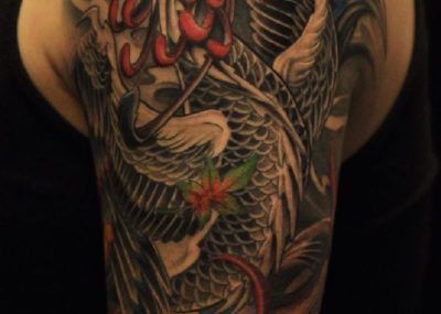 татуировка феникса на плече
