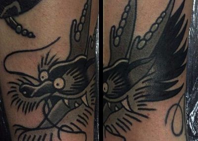 татуировка с головой дракона