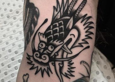 татуировка с головой дракона