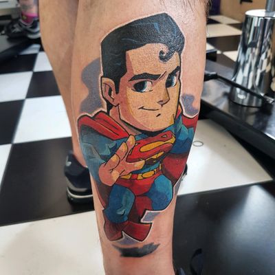 Тату Супермен на ноге